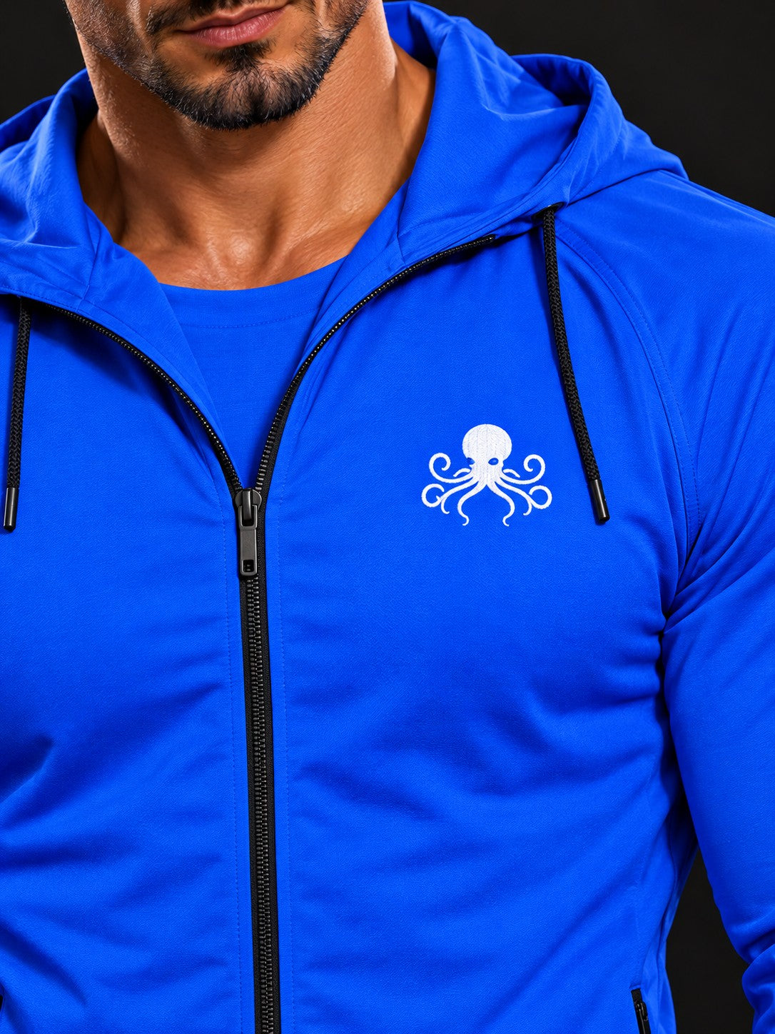 SSS Power Veste - Bleu Roi – détail du logo pieuvre brodé